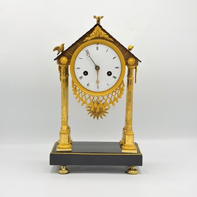 Lot 1045 - French Gilt and Ebonized Bronze Portico Clock