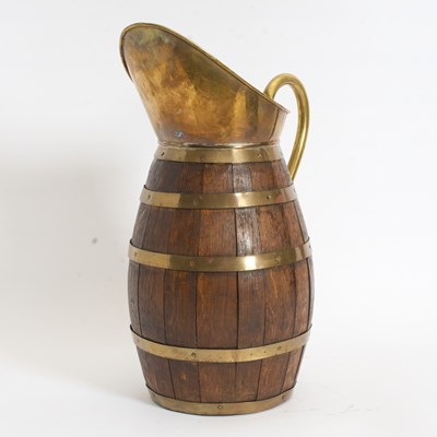 Lot 275 - Brass-Mounted Wood Pitcher
