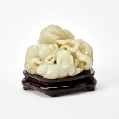 Lot 55 - A Chinese Celadon Jade Figural Group