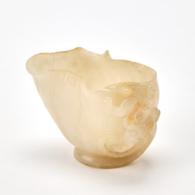 Lot 57 - A Chinese Carved White Jade Water Coupe