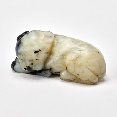 Lot 33 - A Chinese Celadon and Black Jade Figure of a Beast