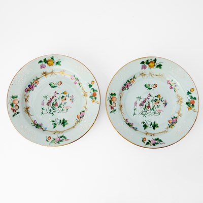 Lot 211 - A Rare Pair of Swedish-Market Chinese Export Slip-Decorated and Enameled Porcelain Plates