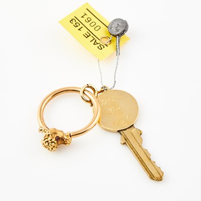 Lot 61 - Gold and Metal Key and Key Holder, 14K and Metal  12 dwt. all