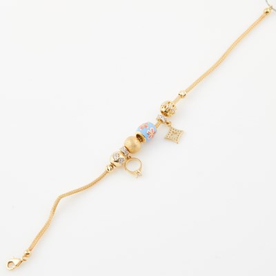 Lot 192 - Gold Charm Bracelet with 6 gold, stone and enamel charms attached, 14K 5 dwt. all