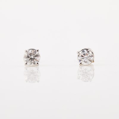 Lot 265 - Two Diamond Solitaire Earrings, 1 stone about 0.50 ct. with copy of GIA Report #15482885, 1 stone   about 0.50 ct., clarity enhanced, 14K