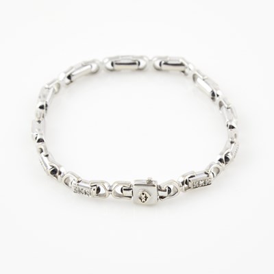 Lot 351 - Diamond and Stone Flexible Bracelet, 33 diamonds  about 0.33 ct., 18K 13 dwt. all, bears signature  Charroil