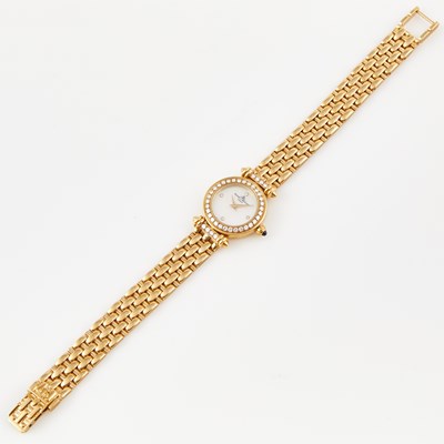 Lot 408 - Ladys Diamond Bracelet Watch, 40 diamonds about 0.60 ct., Baum & Mercier, Quartz, 18K 29 dwt. all