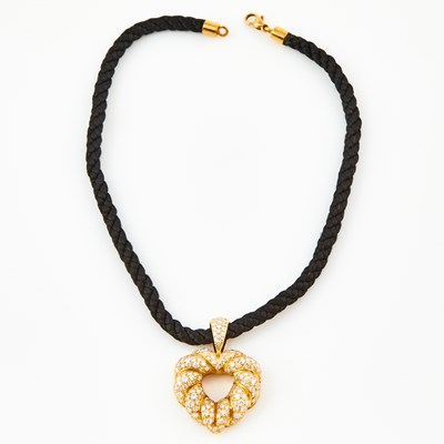 Lot 463 - Diamond Pendant, 195 diamonds about 4.50 cts. and Gold and Cord Neck Chain, 18K 18 dwt. all