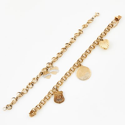 Lot 480 - Two Gold Charm Bracelets with 5 charms attached, 14K 18 dwt., damaged