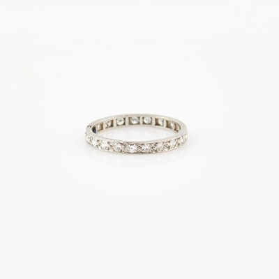 Lot 515 - Diamond Wedding Ring, 21 diamonds about 0.60 ct., Platinum 1 dwt.