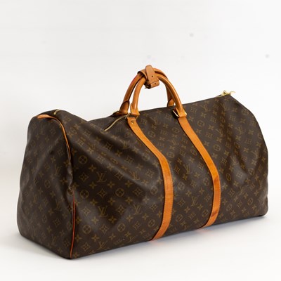 Lot 109 - Louis Vuitton Monogrammed Leather Weekender Duffle Bag