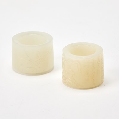 Lot 46 - Two Chinese Carved White Jade Thumb Rings