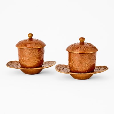 Lot 486 - A Pair of Chinese Brown Glazed Porcelain Teacups and Stands