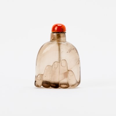 Lot 19 - A Chinese Carved Smoky Crystal Snuff Bottle
