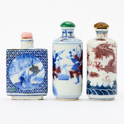 Lot 540 - Three Blue and White and Copper Red Porcelain Snuff Bottles
