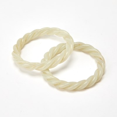 Lot 48 - A Pair of Chinese White Jade Bangles