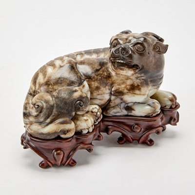 Lot 27 - A Chinese Carved Mottled Jade Beast