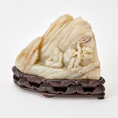 Lot 62 - A Chinese Russet and Celadon Jade Boulder