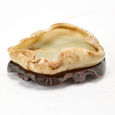 Lot 43 - A Chinese Russet and Pale Celadon Jade Carving