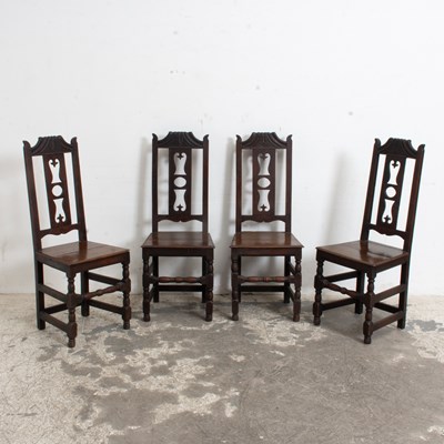 Lot 194 - Set of Four William and Mary Style Carved Oak Dining Chairs