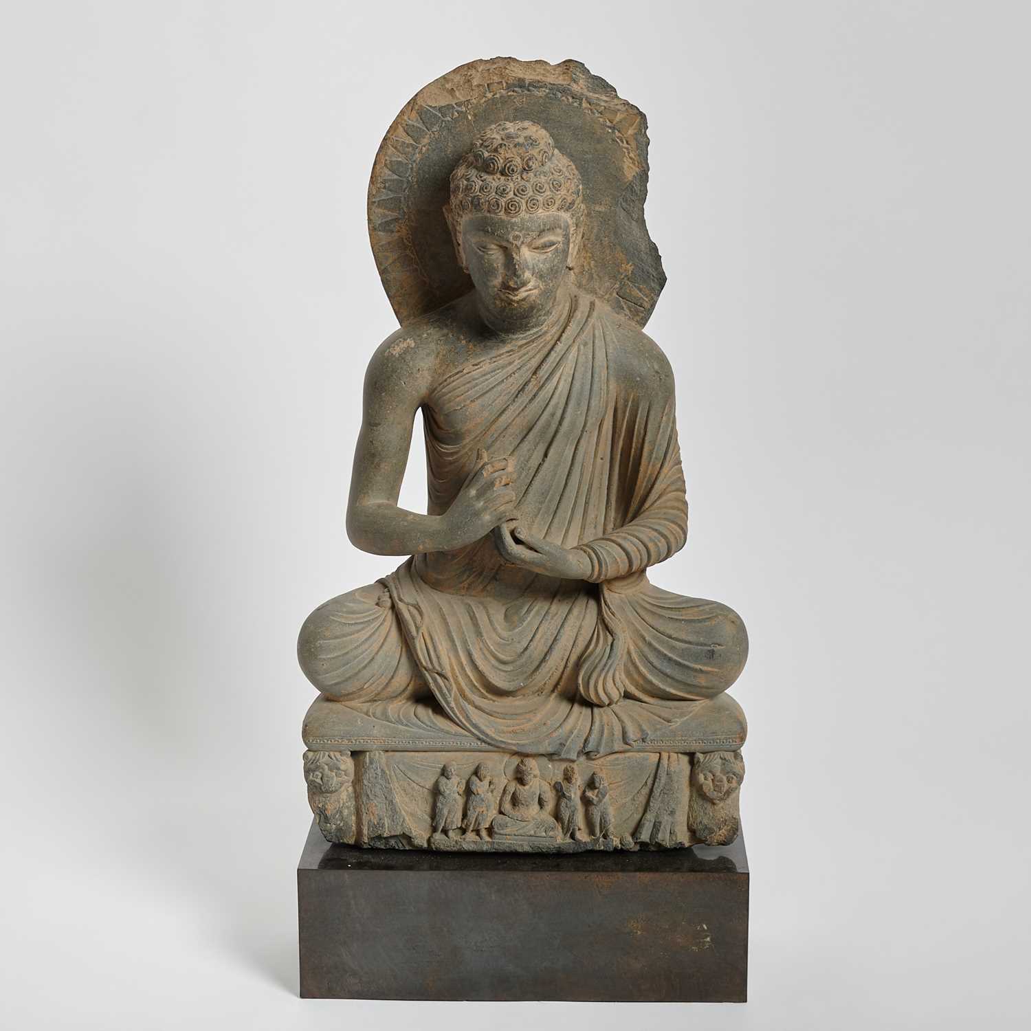 Lot 338 - An Important Gandharan Carved Grey Schist Figure of Buddha