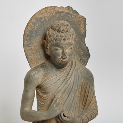 Lot 338 - An Important Gandharan Carved Grey Schist Figure of Buddha