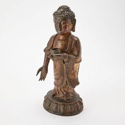 Lot 91 - A Chinese Gilt Lacquered Bronze Figure of Shakyamuni