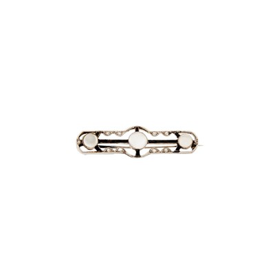 Lot 1105 - White Gold, Moonstone, Black Onyx and Diamond Bar Pin