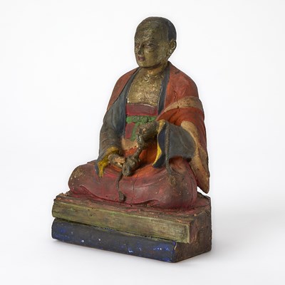 Lot 309 - A Tibetan Polychrome Lacquered Wood Figure of a Monk