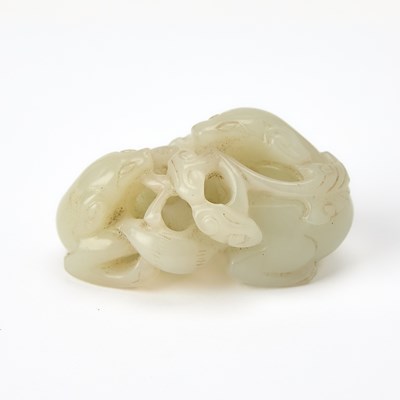 Lot 53 - A Chinese Pale Celadon Jade Figural Group