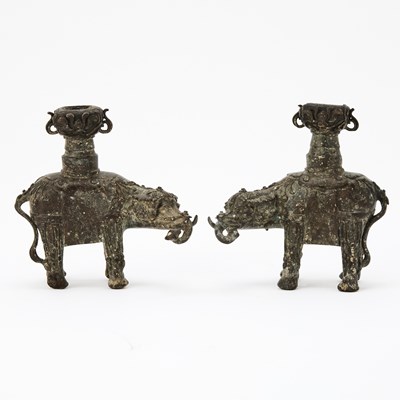 Lot 89 - A Pair of Chinese Bronze Elephant Candle Holders
