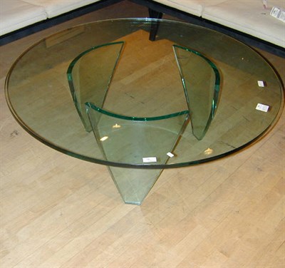Lot 204 - Glass Low Table The circular top raised on...