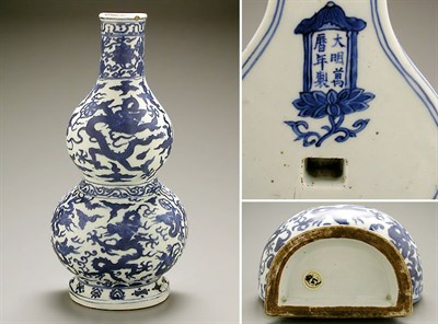 Lot 102 - BLUE AND WHITE PORCELAIN DOUBLE-GOURD WALL...