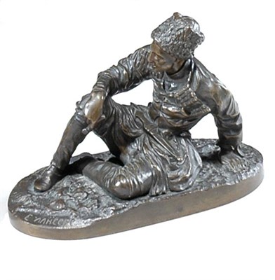 Lot 2429 - Russian Patinated-Bronze Figure of a Cossack...